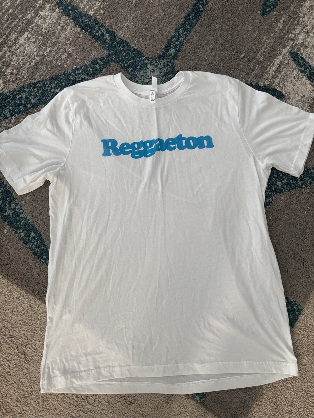 White Reggaeton Graphic T-Shirt with Blue Logo